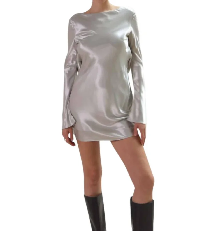 Fashion pieces that complement every woman’s style   Kim Open Back Long Sleeve Mini Dress In Silver